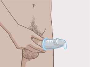 Hold the condom by the rim and make sure no semen spills out.