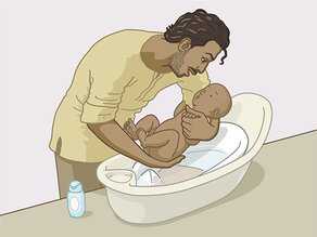 Een vader geeft zijn baby een badje.
